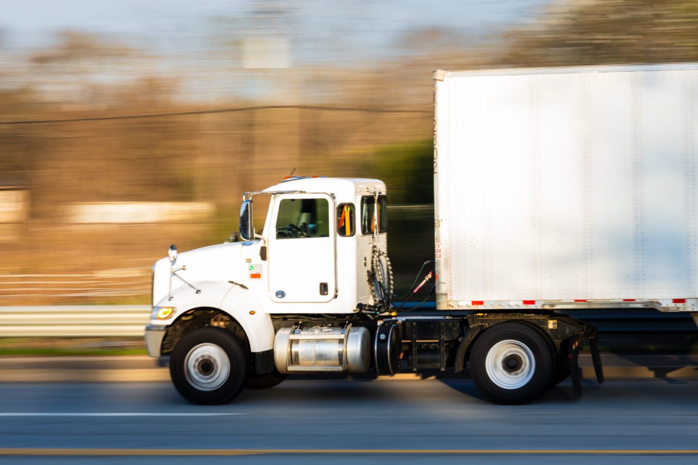 White truck travelling