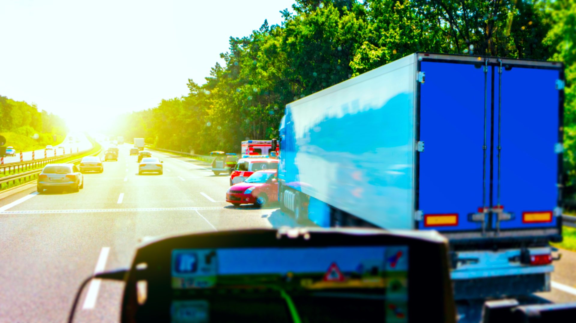 blue semi truck into an accident with red vehicle