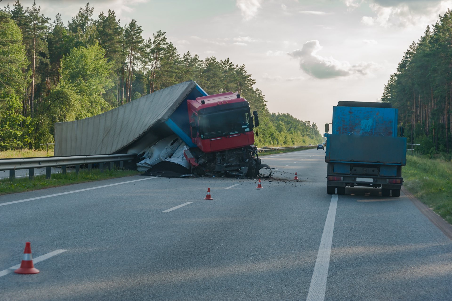 Accident on autobahn - rollover truck on road, car crush