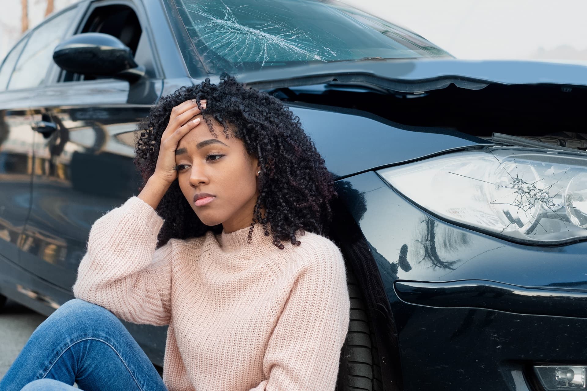 Car accident and black woman feeling pain
