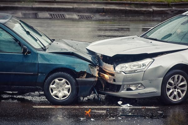 Two cars in a head-on collision | personal injury law firm​ | Henderson Taylor Law Firm