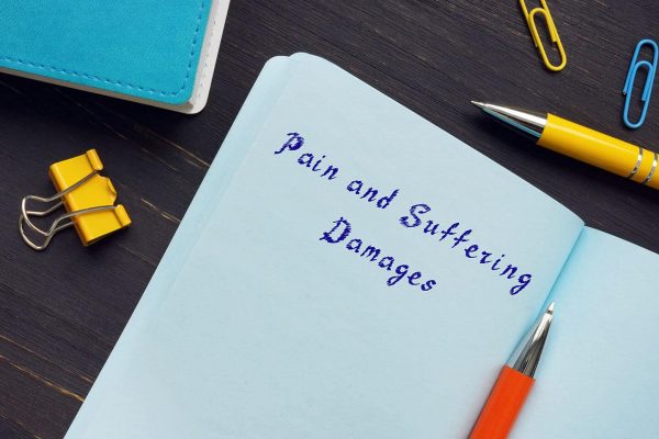 Pain and suffering damages notebook | personal injury law firm​ | Henderson Taylor Law Firm