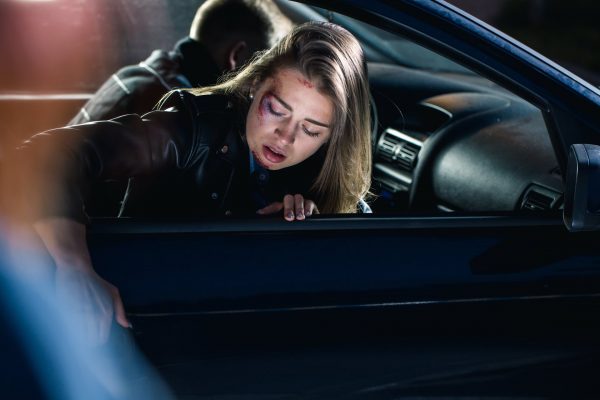 Woman in accident trying to get out of vehicle