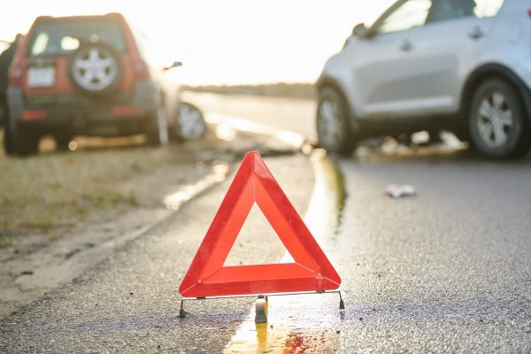 Warning sign after Oregon car crash | personal injury law firm​ | Henderson Taylor Law Firm