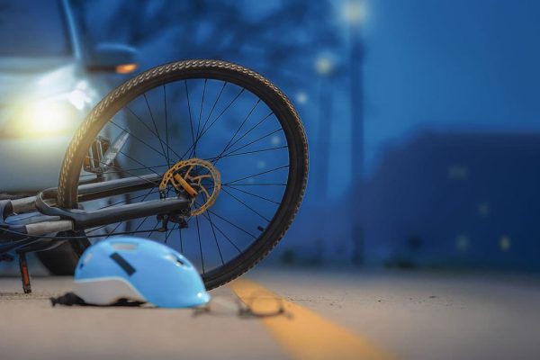 Bicycle accident scene at night | bicycle accident lawyer​ | Henderson Taylor Law Firm